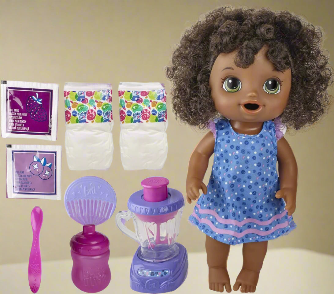 Toy doll with accessories including a blender, sippy cup, and diapers on a white background